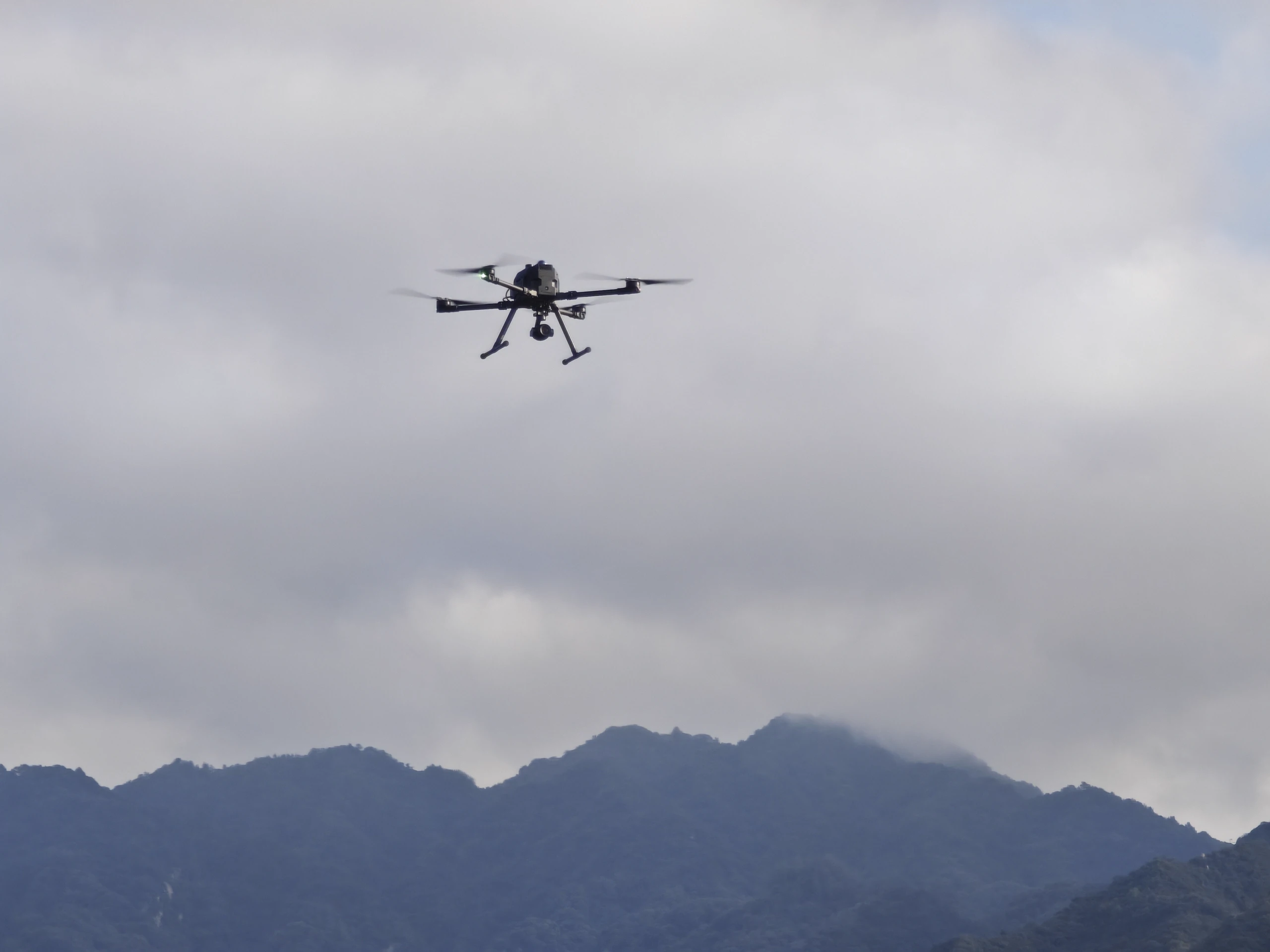 ARC response drone searching above mountainous terrain